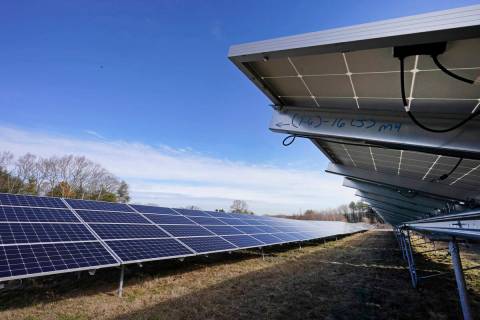 Solar panels face the sky on Jan. 26, 2021, in Burrillville, R.I., at ISM Solar's 10-acre solar ...