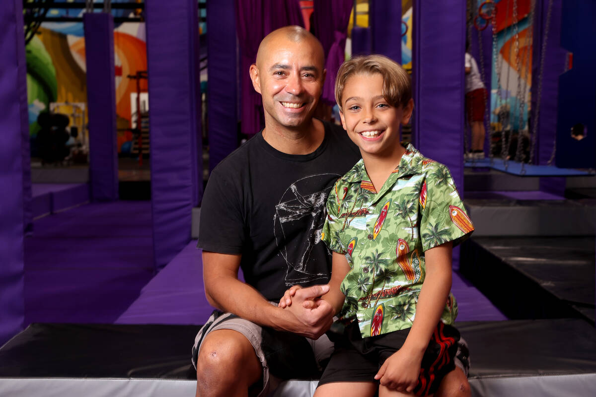 Jonas Woolverton and his son, Phoenix, 8, at Las Vegas Circus Center on Wednesday, June 15, 202 ...