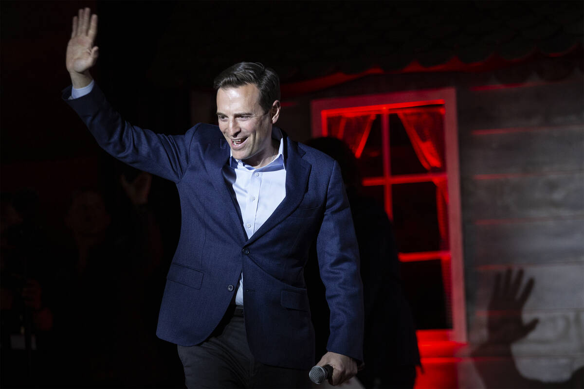 Nevada Republican U.S. Senate candidate Adam Laxalt takes the stage during a rally with Florida ...