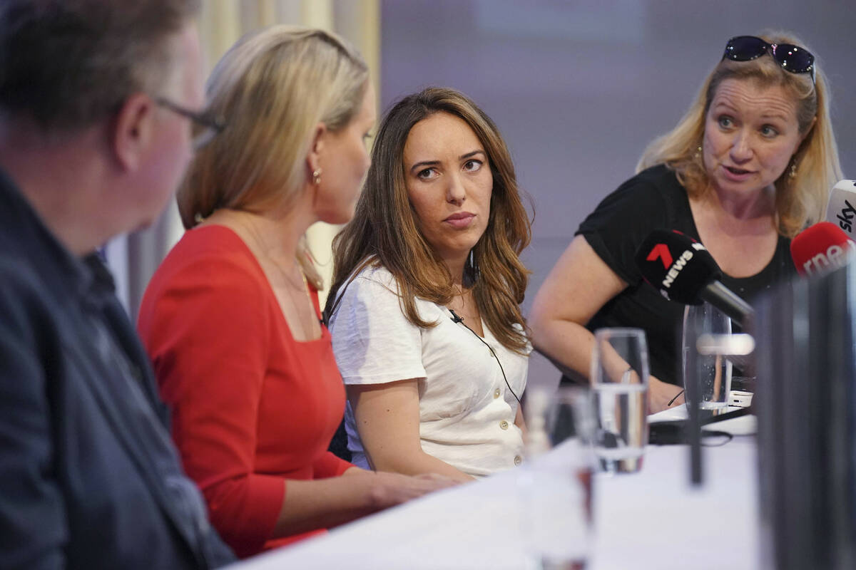 From left, NUJ official Tim Dawson, WikiLeaks founder Julian Assange's lawyer Jennifer Robinson ...