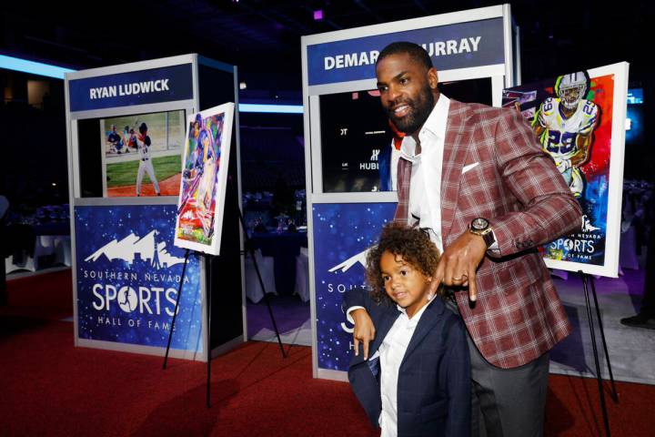 Southern Nevada Sports Hall of Fame inductee DeMarco Murray poses for a photo with his son Park ...