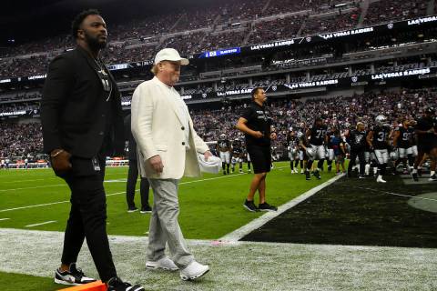 Raiders owner Mark Davis, center, is seen before an NFL football game between the Raiders and t ...