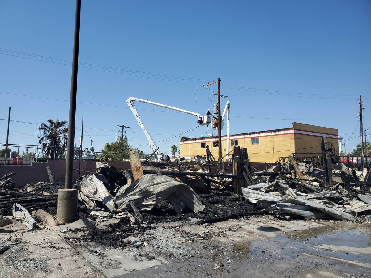 Las Vegas firefighters investigate a fire Sunday morning, June 19, 2022, around 200 Tower Stree ...