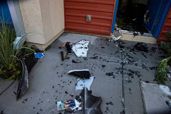 Damage and debris at the scene where a fire damaged or destroyed at least 10 buildings at a con ...