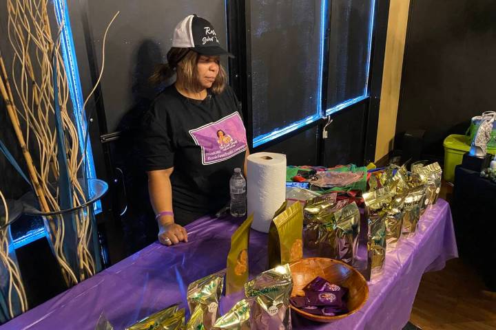 Charissa Anderson-Lynch, owner of Ressie Sweet Treats, at her vendor table at a pop up shop at ...