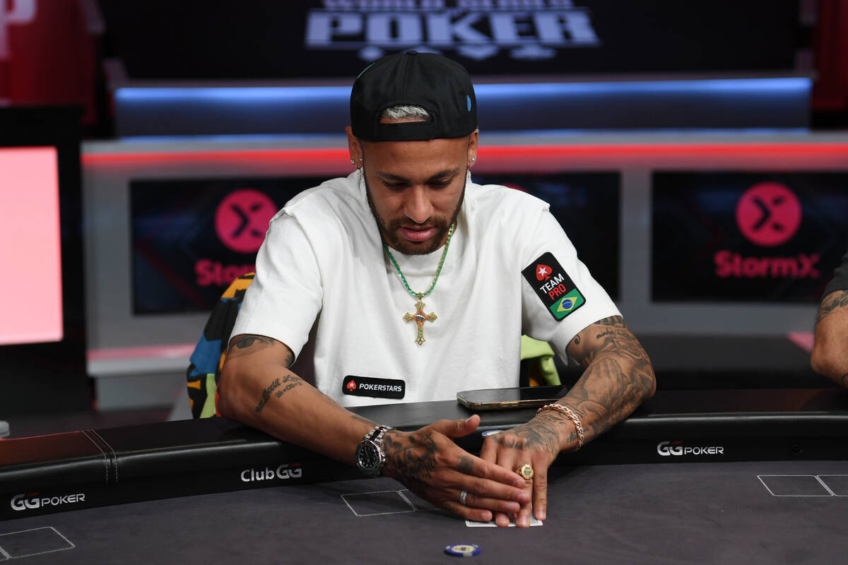 Brazilian soccer star Neymar da Silva Santos Junior plays at the 2022 World Series of Poker at ...