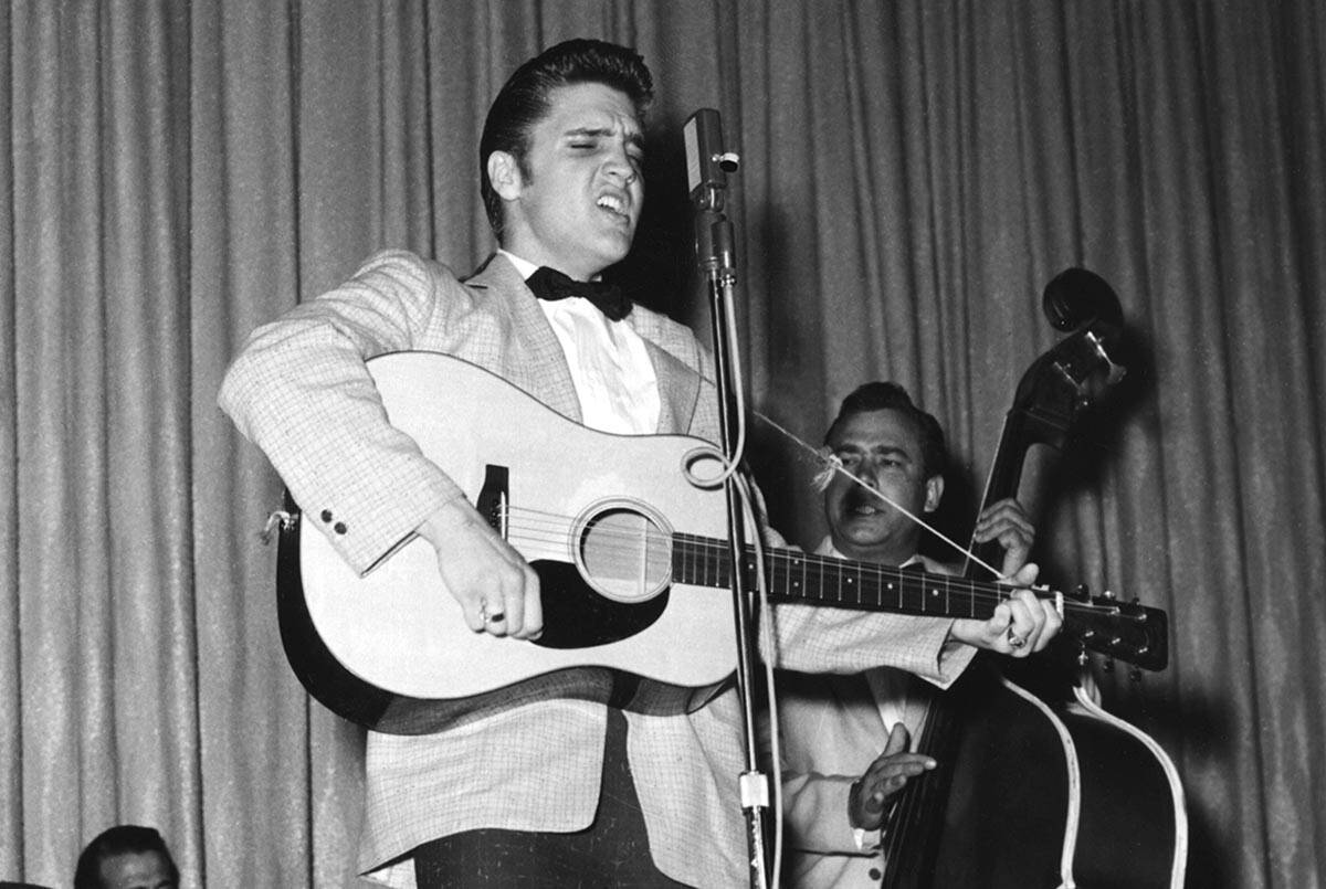Elvis performs during his first run of shows at the New Frontier on April 30, 1956, in Las Vega ...