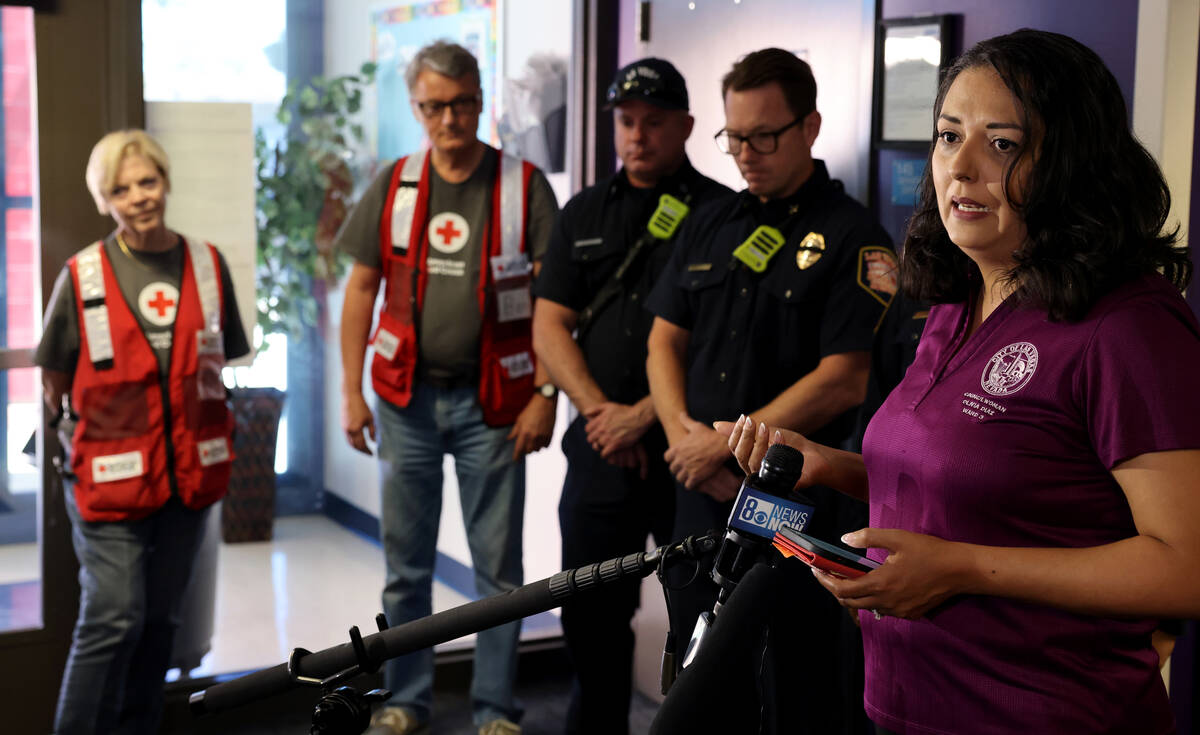 Las Vegas City Councilwoman Olivia Diaz, right, talks to the news media at an American Red Cros ...