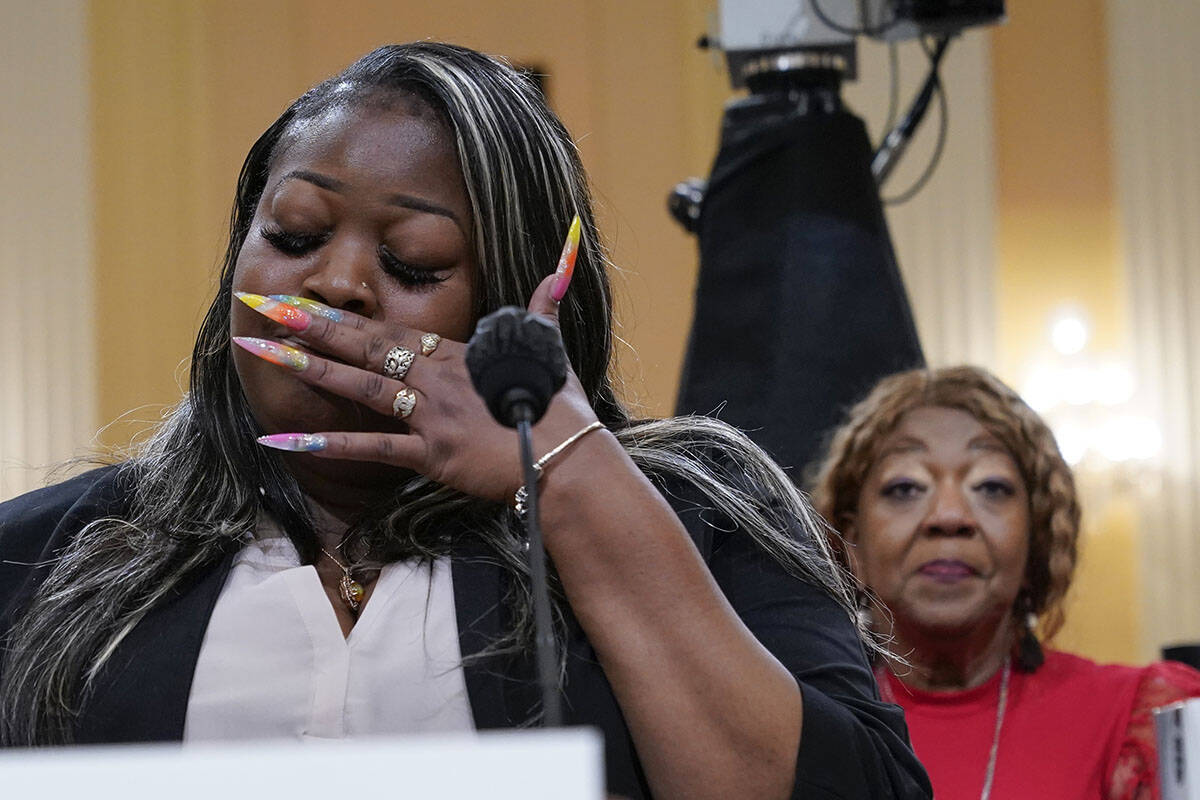 Wandrea "Shaye" Moss, a former Georgia election worker, testifies as he mother, Ruby ...