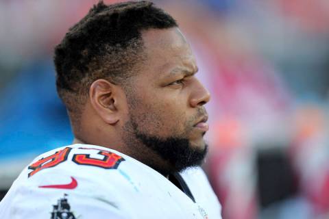 Tampa Bay Buccaneers defensive end Ndamukong Suh (93) sits on the bench during a NFL divisional ...