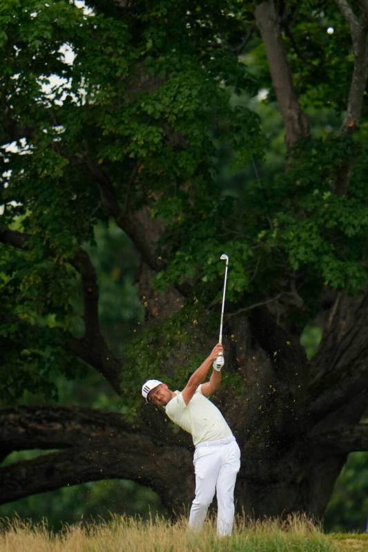 Xander Schauffele hits on the sixth hole during the second round of the U.S. Open golf tourname ...
