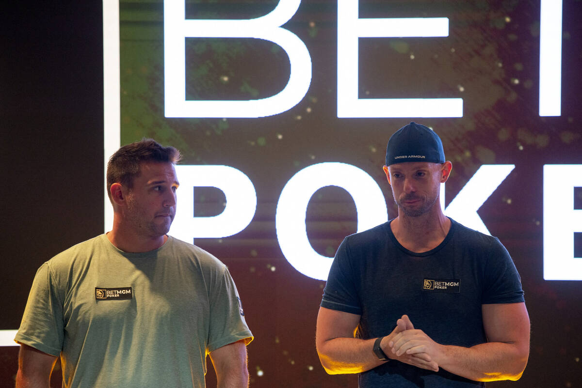 Professional poker players Darren Elias, left, and Matt Berkey address the players at the Poker ...