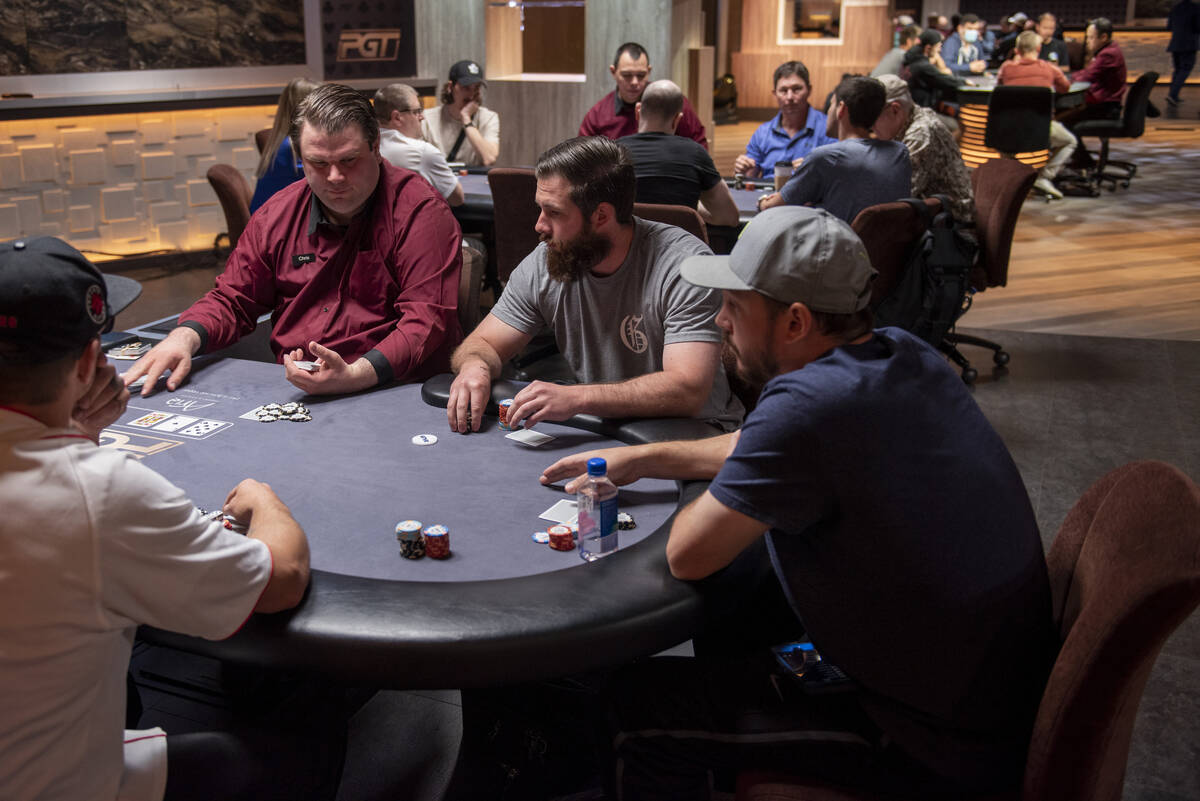 Poker players gather at the PokerGO studio at Aria for the $25,000 free roll before the start o ...