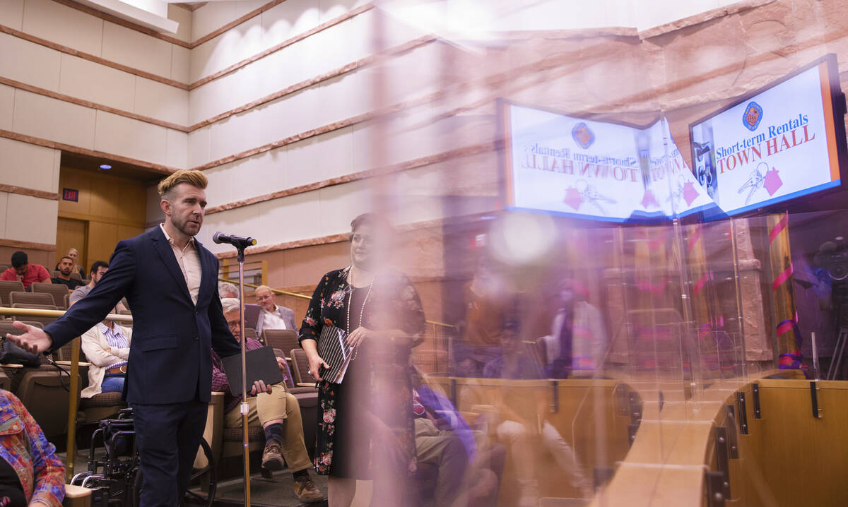 Dwight Calwhite, left, an Airbnb owner/operator, speaks during a town hall regarding the regula ...