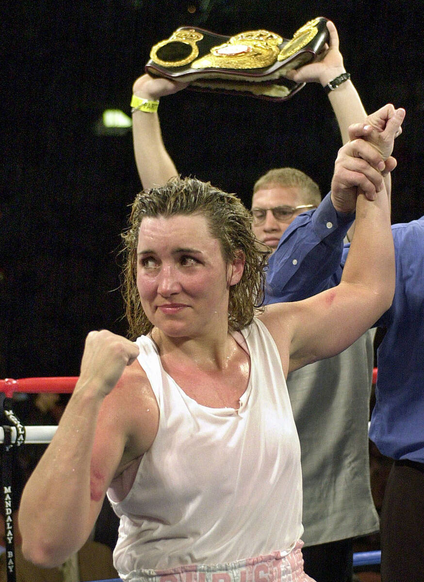 In this March 3, 2001, file photo, Christy Martin looks toward her corner following her unanimo ...