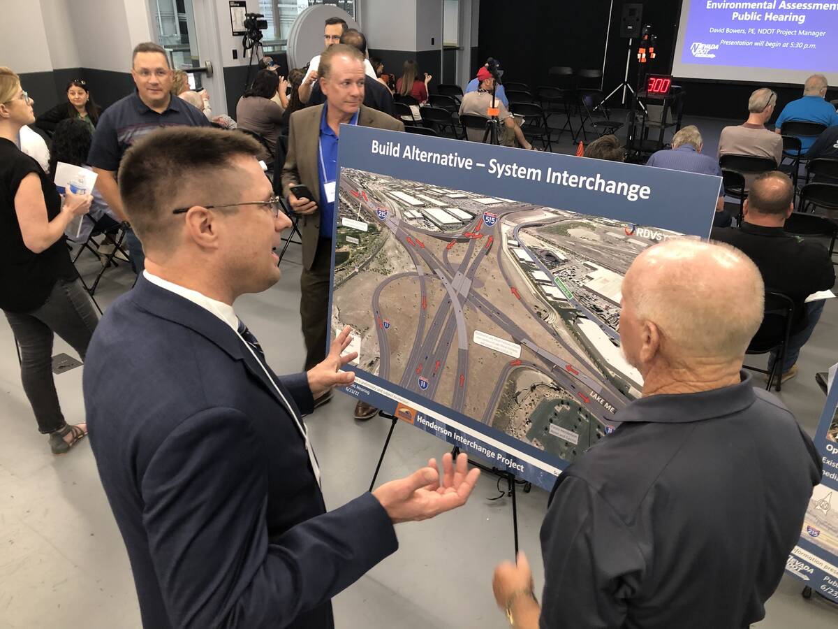 NDOT assistant project manager Dallas Affleck discusses the Henderson Interchange Project with ...