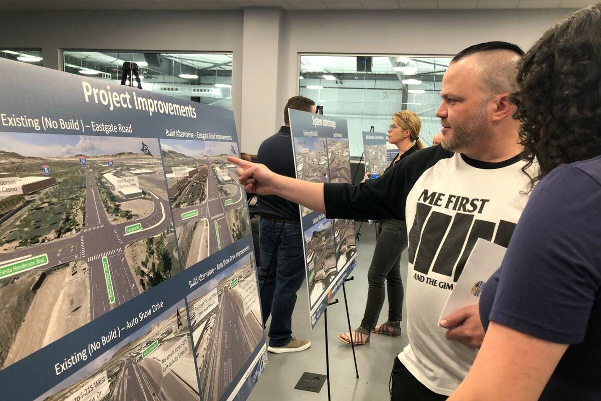 Henderson resident Lance Plautz points at a preview image for the Henderson Interchange Project ...