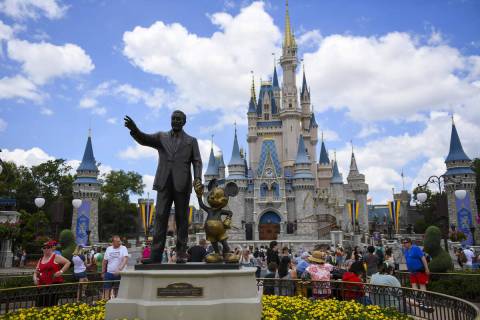 The "Partners" statue sits in front of Cinderella's Castle at Magic Kingdom on Wednes ...