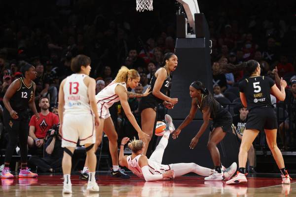 Las Vegas Aces and Washington Mystics players fight for the ball during the second half of a WN ...