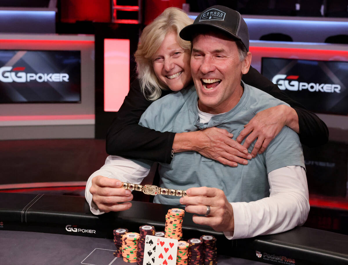 Eric Smidinger gets a hug from his wife Betsy Smidinger after winning the World Series of Poker ...