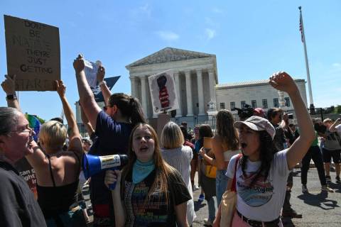 Abortion rights demonstrators protest in front of the U.S. Supreme Court in Washington, D.C., o ...