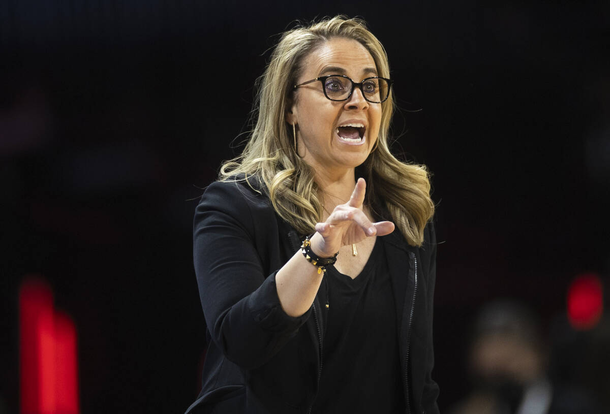 Aces head coach Becky Hammon directs her team in the second half during a WNBA basketball game ...