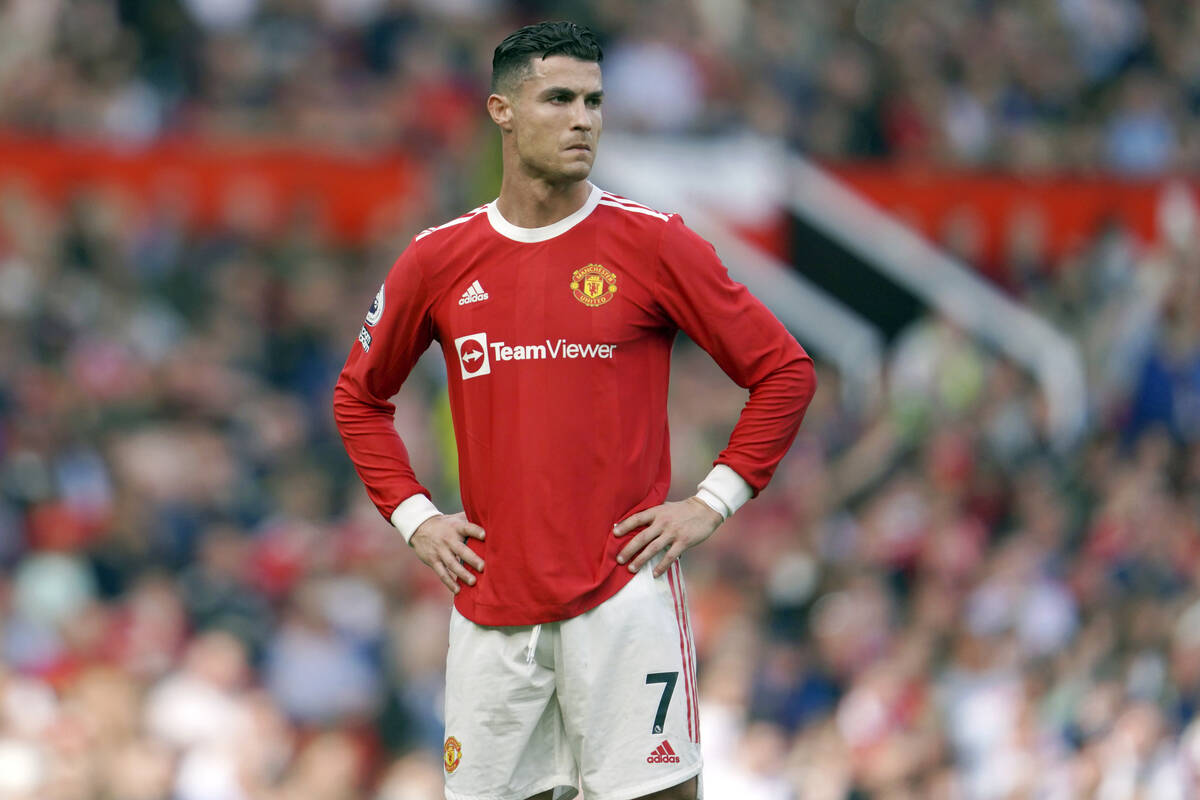 FILE- Manchester United's Cristiano Ronaldo stands on the pitch during the English Premier Leag ...