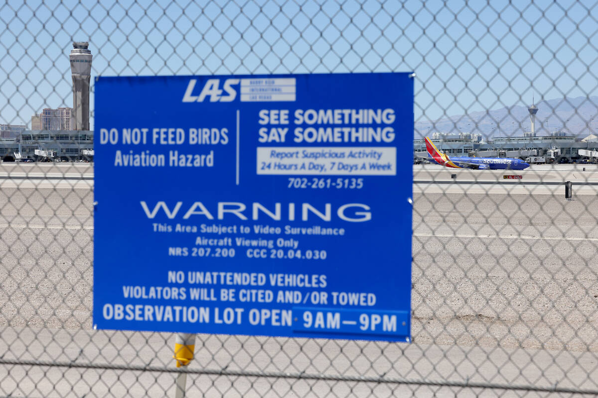 Planes taxi at the Harry Reid International Airport viewing area on Sunset Road in Las Vegas Fr ...