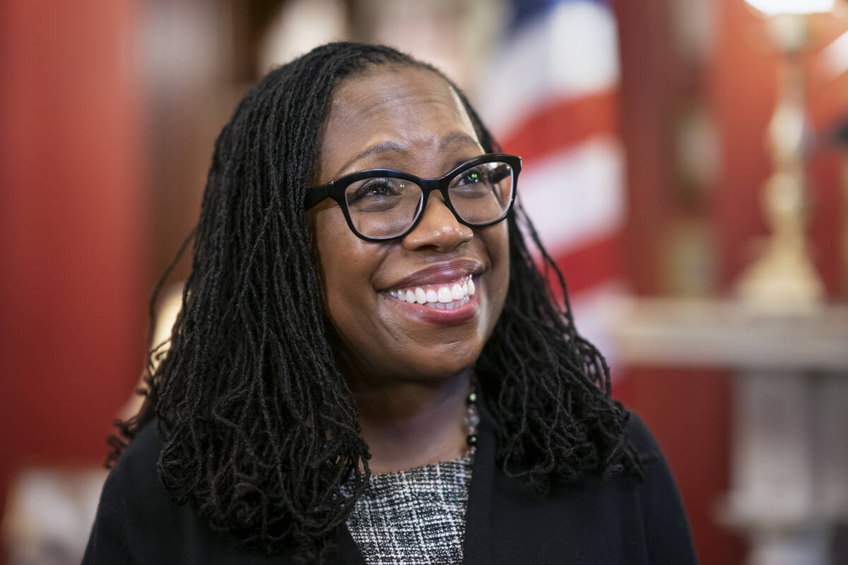 FILE - Supreme Court nominee Judge Ketanji Brown Jackson smiles as Sen. Richard Shelby, R-Ala., ...