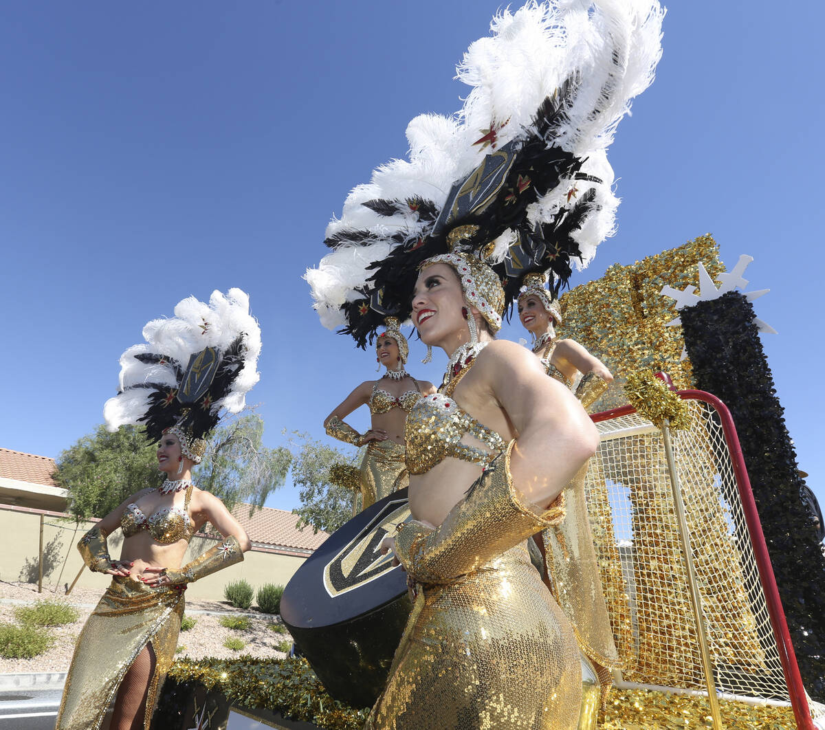In this July 4, 2019, file photo, Golden Knight showgirls take a group photo during the 25th an ...