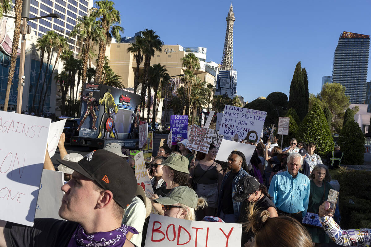 A rally for women’s rights marches down Las Vegas Boulevard, Friday, July 1, 2022, on th ...
