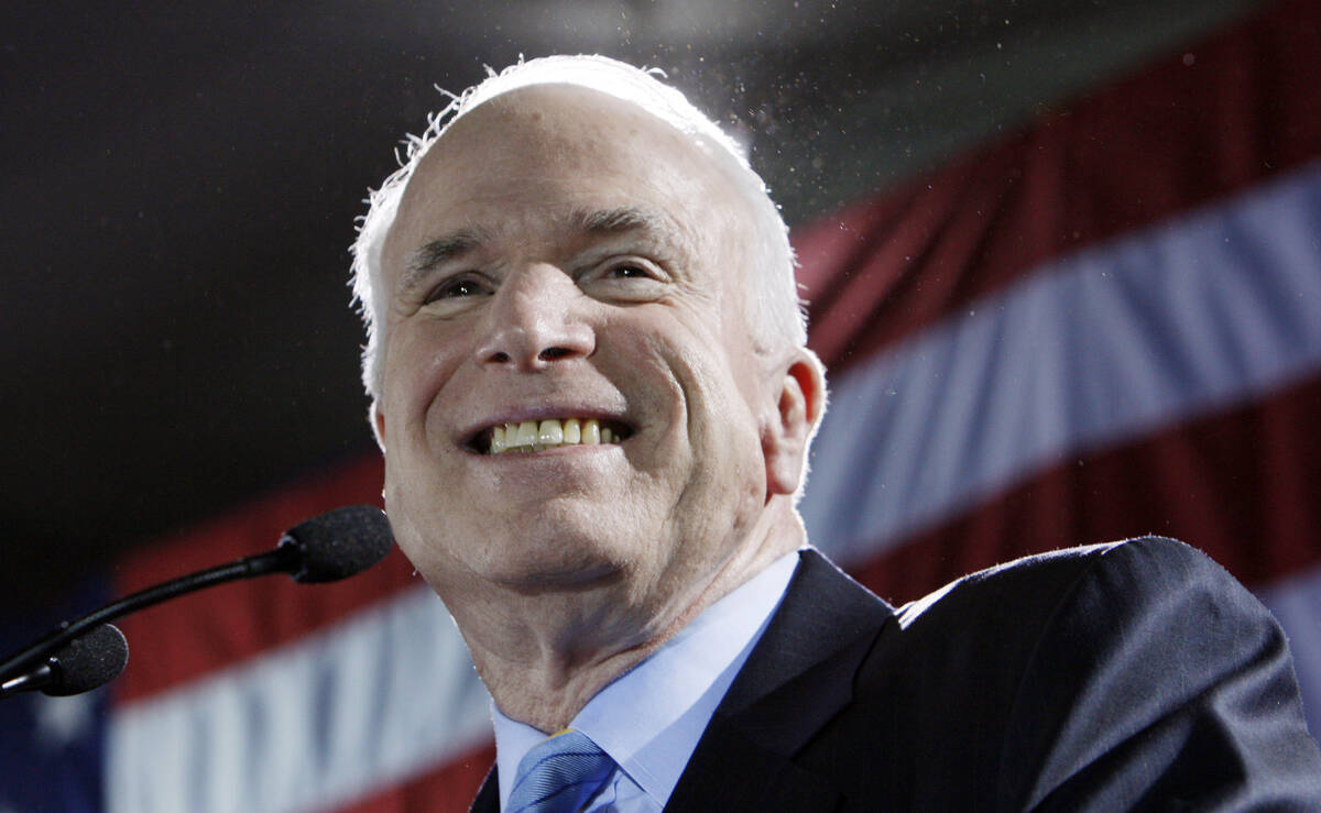 FILE - Sen. John McCain, R-Ariz., Republican presidential hopeful, celebrates in Miami after wi ...