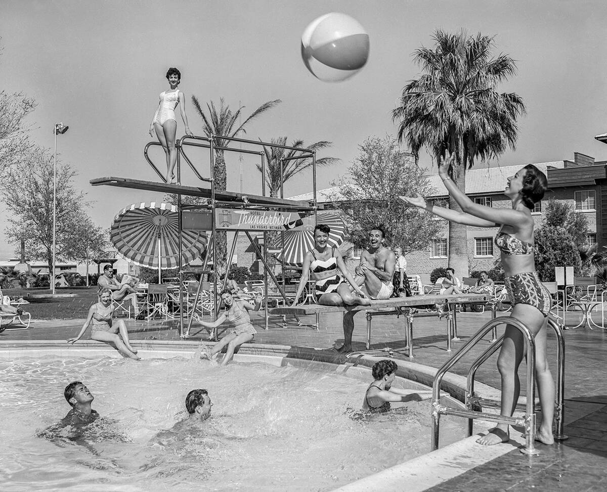 Guests enjoy the pool at the Thunderbird Hotel on April 6, 1956. (Las Vegas News Bureau)