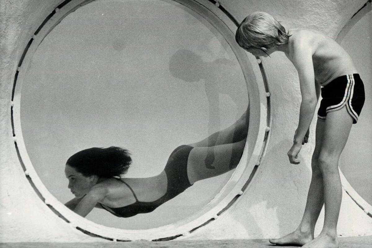The Mirage Motel on the Las Vegas Strip featured an aboveground swimming pool with porthole win ...