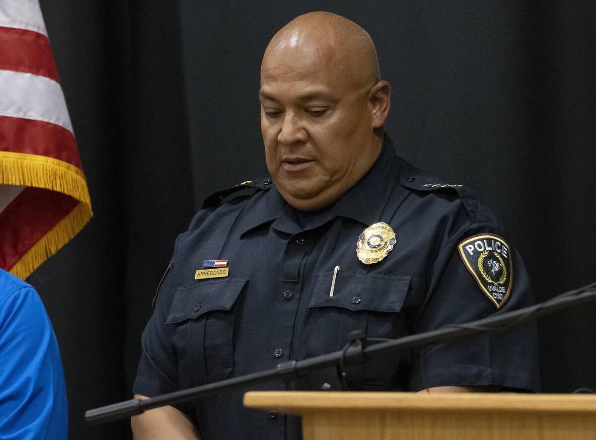 Uvalde schools police Chief Pedro "Pete" Arredondo listens during a news conference a ...