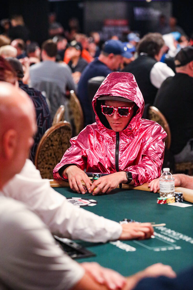 Luke Weidner, of Colorado, plays poker during the first flight of the $10,000 Main Event No-Lim ...