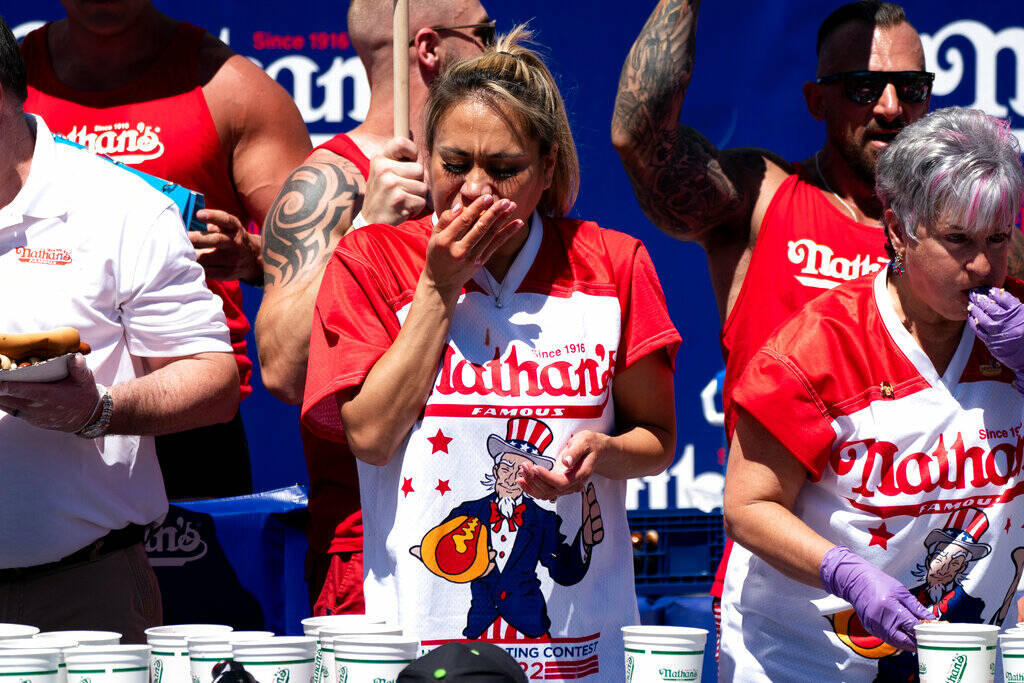 Miki Sudo competes in the Nathan's Famous Fourth of July hot dog eating contest in Coney Island ...