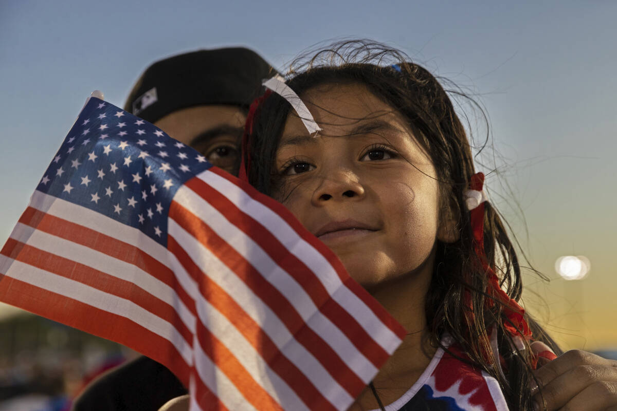 Emily Sandoval, 9, waits for the fireworks to start during a Fourth of July celebration at Heri ...