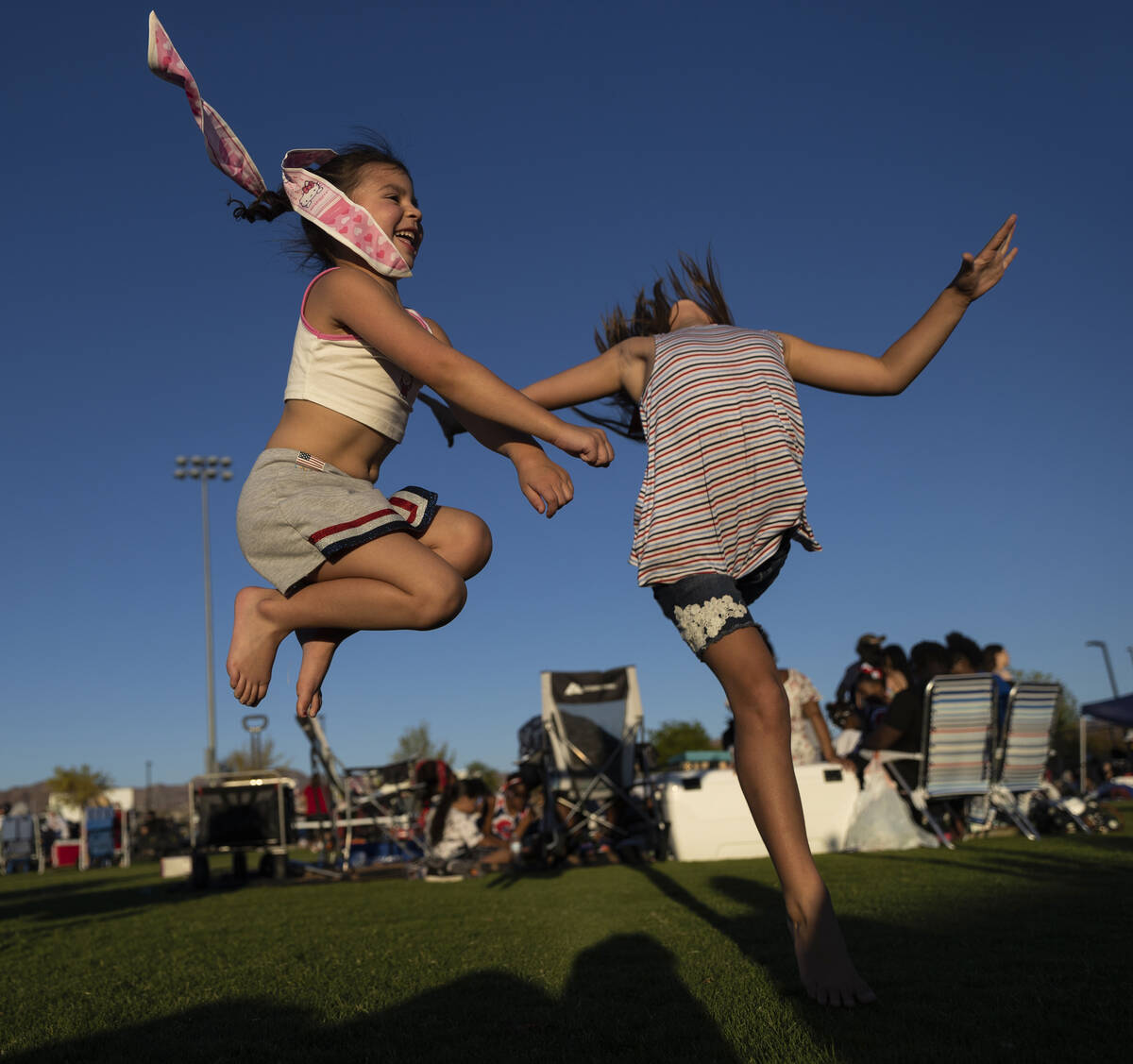 Hazen Hunter, right, 7, dances during a Fourth of July celebration at Heritage Park on Monday, ...