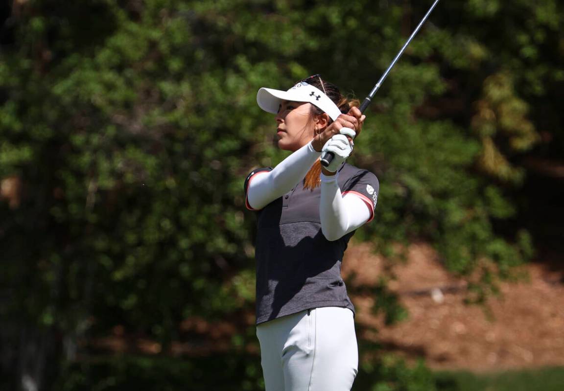 Alison Lee watches her fairway shot on the ninth hole during the second day of round-robin in t ...