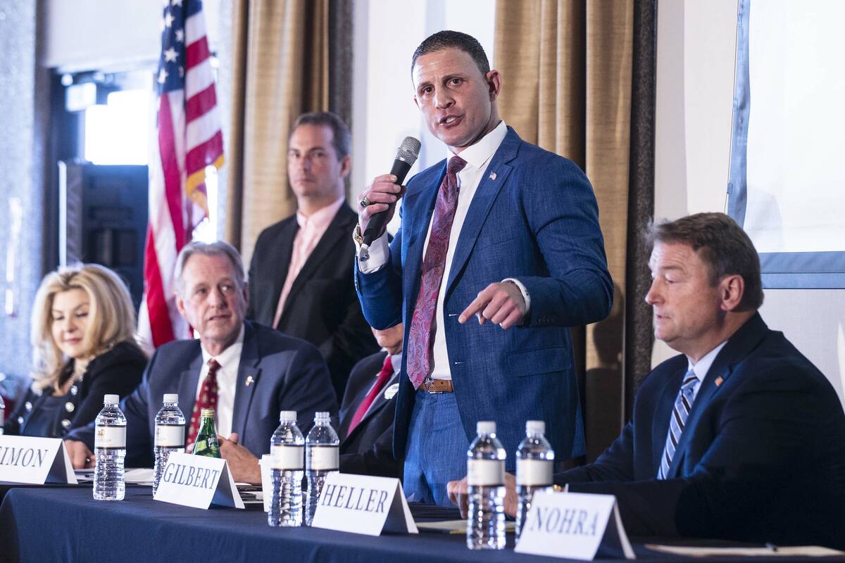 Nevada Republican governor candidates Michele Fiore, left, former North Las Vegas Mayor John Le ...