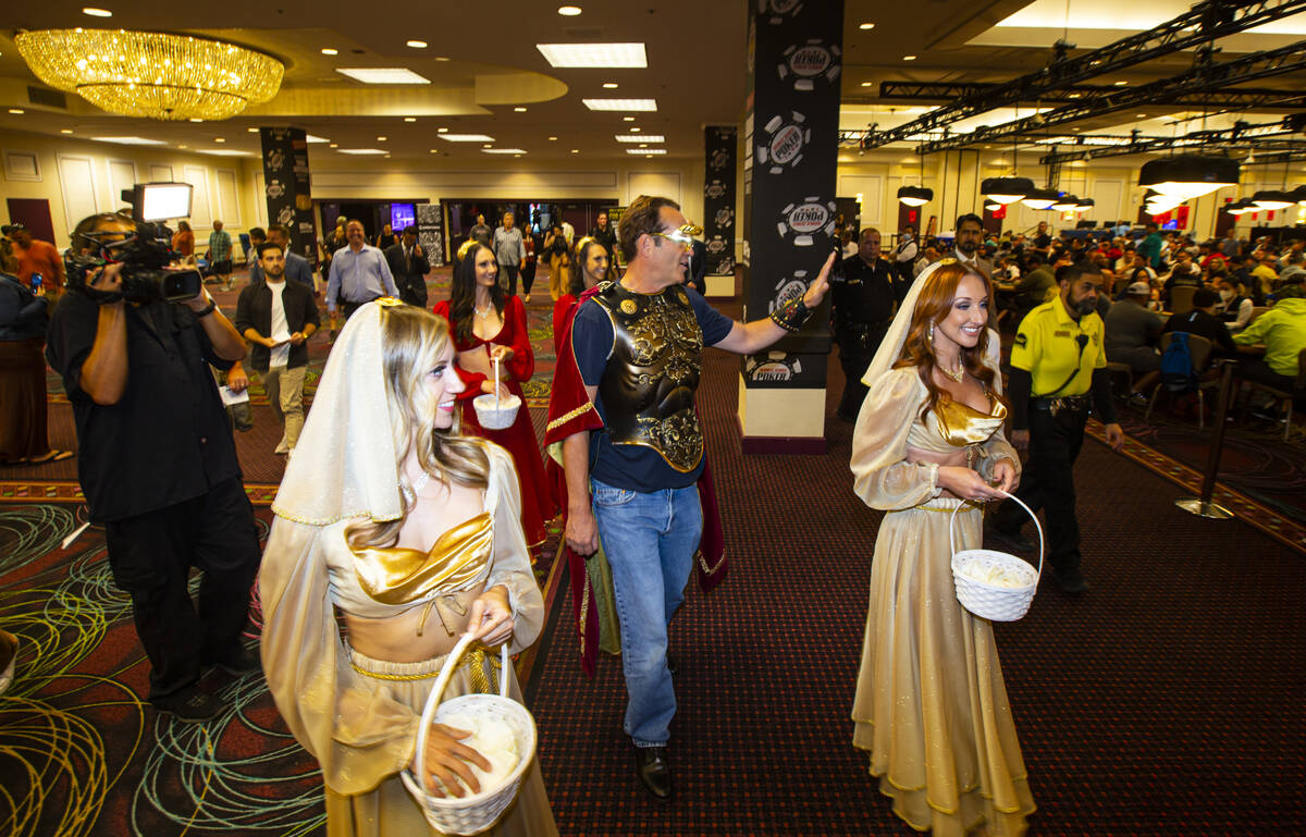 Actor and World Series of Poker master of ceremonies Vince Vaughn walks around during the WSOP ...