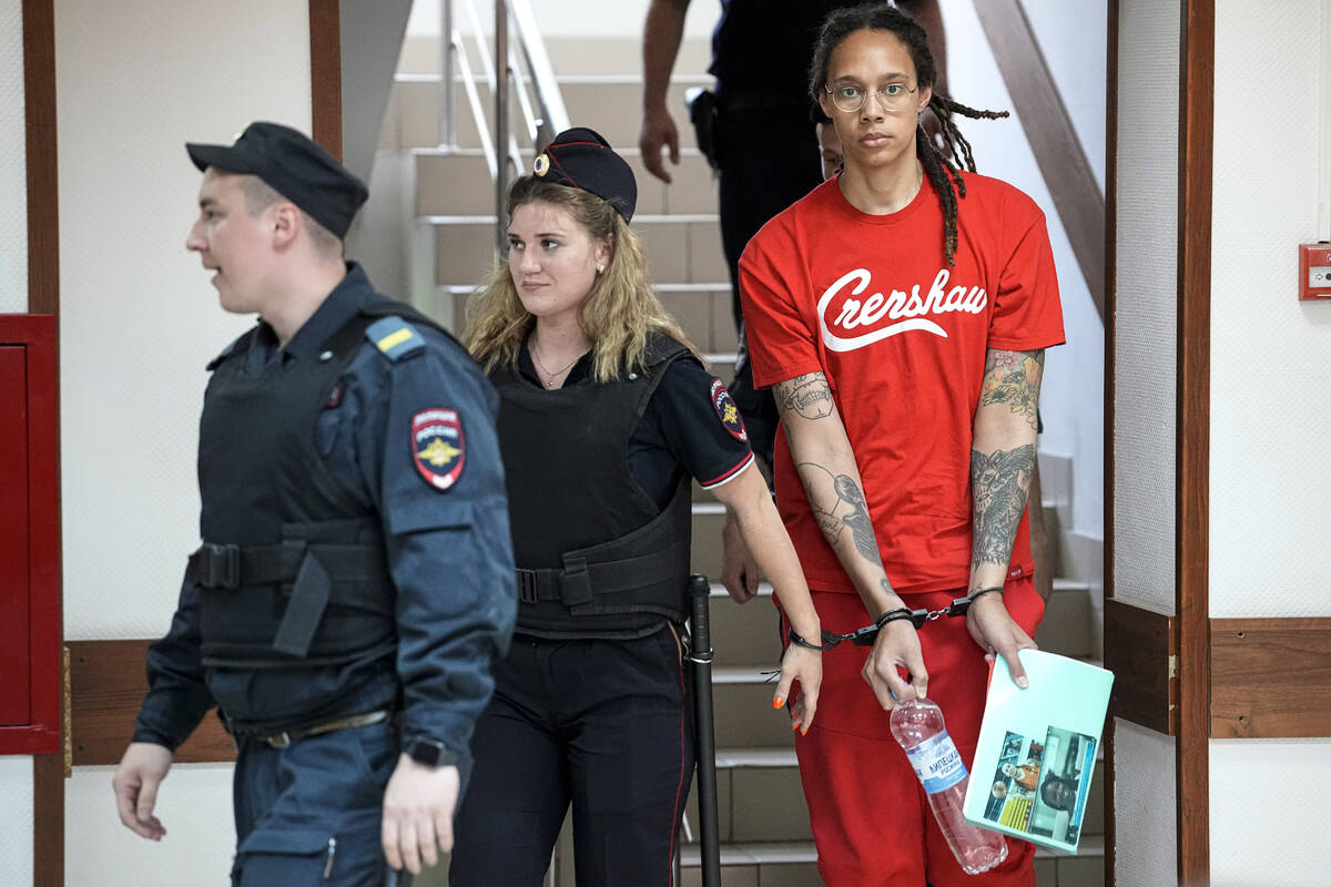 WNBA star and two-time Olympic gold medalist Brittney Griner is escorted to a courtroom for a h ...