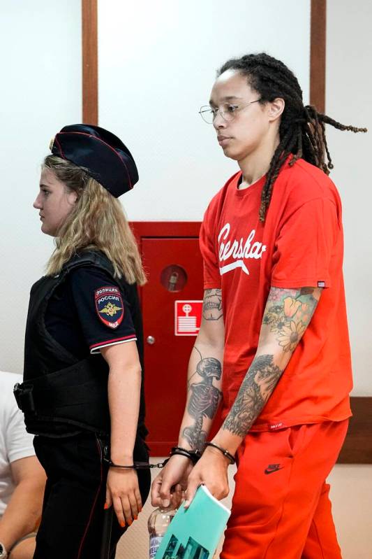 WNBA star and two-time Olympic gold medalist Brittney Griner is escorted to a courtroom for a h ...