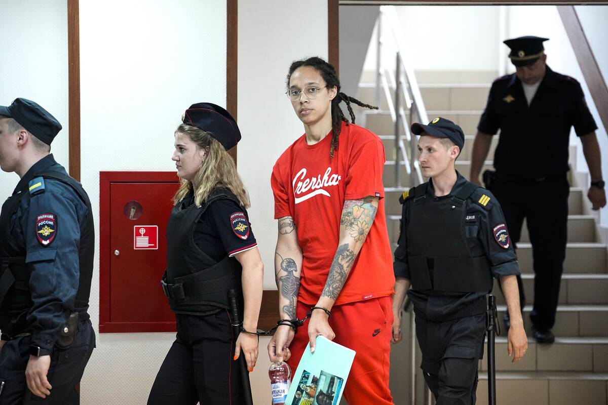 WNBA star and two-time Olympic gold medalist Brittney Griner is escorted to a courtroom for a h ...