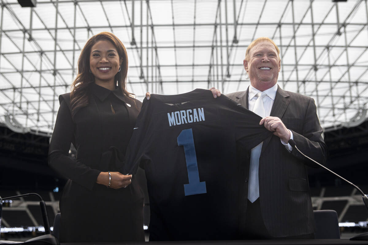 Raiders owner Mark Davis poses for a portrait with new team president Sandra Douglass Morgan on ...