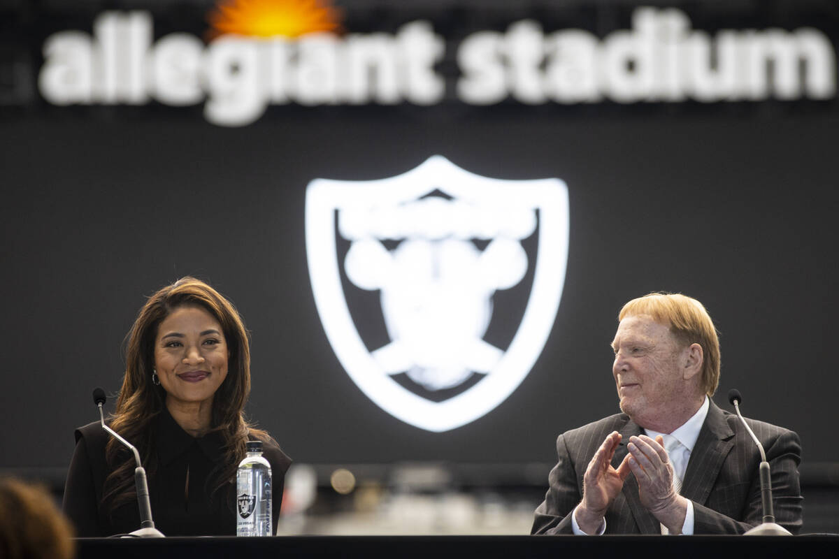 Sandra Douglass Morgan, the new president of the Raiders, speaks as team owner Mark Davis looks ...