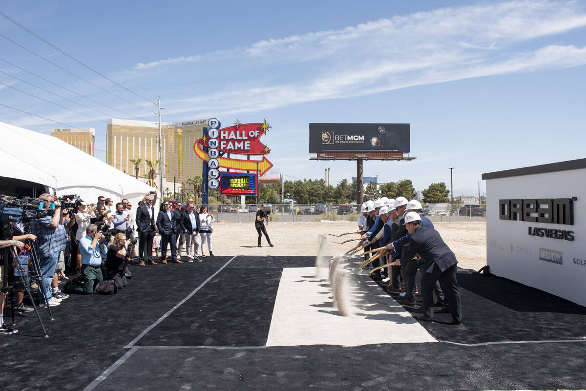 Project partners and guests pose for a photo during the groundbreaking for the Dream Las Vegas ...