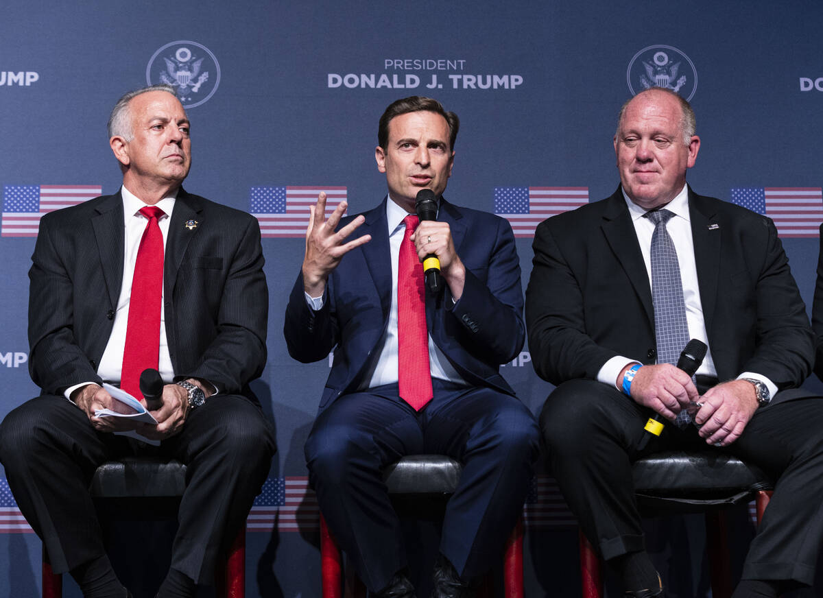 Former Nevada Attorney General Adam Laxalt, center, speaks as Clark County Sheriff Joe Lombardo ...