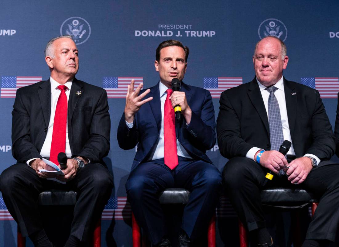 Former Nevada Attorney General Adam Laxalt, center, speaks as Clark County Sheriff Joe Lombardo ...